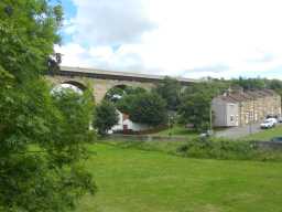 Oblique view of Newton Cap Railway Viaduct over River Wear, Bishop Auckland and nearby housing July 2016